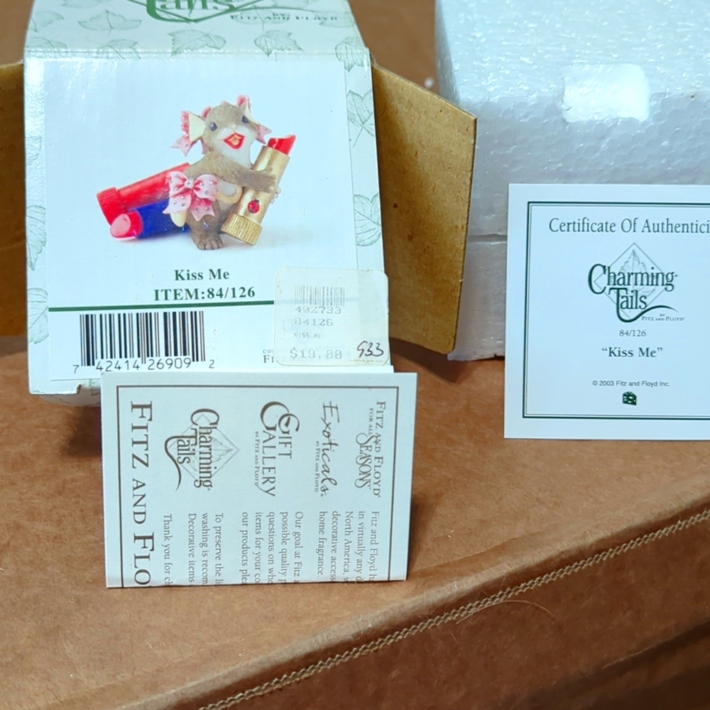 Charming tails figurine. Kiss me 2004 ceramic figurine. Retired